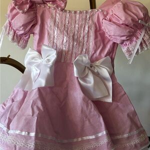 Pink Dress with White Bows and Lace